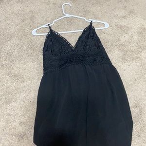 Long black lacey dress.